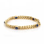 Armoured bracelet with sapphire cabochons