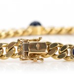 Armoured bracelet with sapphire cabochons