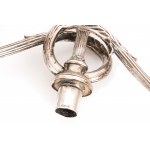Three-armed silver candlestick with ionic capitals