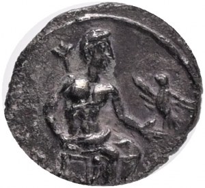 CILICIA, Uncertain AR Obol, 4th Century BC.Obv: Baaltars seated right, holding lotus-tipped scepter with eagle landing on his extended left hand.Rev: Helmeted head of Athena to right.Ref: SNG Levante 244. AR 0,7g.