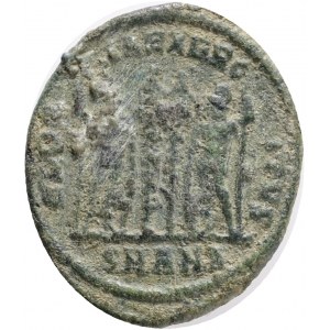 CONSTANTINE I. 307-337 AD. Æ Follis,Antioch mint.Obv.: CONSTANTI NVS MAX AVG, laureate (with rosettes), draped and cuirassed bust right. Rev.: GLORIA EXERCITVS, two soldiers, each holding reversed speaand resting on shield, flanking two standards; SMANA/.
