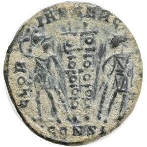 Constantius II as Caesar (324-337). AE, Follis. Constantinople.Obv: FL IVL CONSTANTIVS NOB C. Bust of Constantius, laureate, draped and cuirassed.Rev: GLORIA EXERCITVS, CONSI. Two soldiers standing facing one another, each holding spear and resting hand u