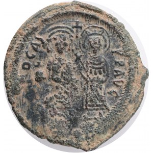 Byzantine, Phocas Æ 40 Nummi. Constantinople, dated RY 1 = 602/3.Obv: δ M FOCAЄ P P AVG, Phocas and Leontia standing facing, holding globus cruciger and cruciform sceptre, respectively; cross between . Rev: Large M; cross above, ANNO downwards in left fie