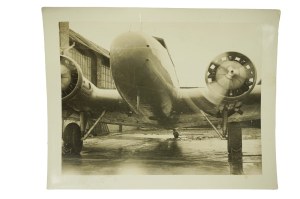 Old aircraft at the hangar of UNITED NAT [National Air Transport] AIR LINES company - set of 2 photographs