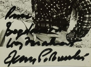 Jerzy Połomski [1933-2022] autographs a photograph with his image on it
