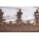 Five-light frieze in carved wood 19th century 160 x 14 x 14 cm with plant motifs and a beaded edge. State of preservation: fair, some missing gilding, one missing floral frieze., Five-light frieze in carved wood 19th century 160 x 14 x 14 cm with plant mo