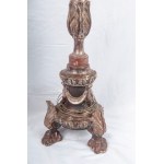 Golden wooden floor lamp late 19th century early 20th century 140 x 27 cm carved and engraved with a three-legged base with feral support feet, cylindrical shaft with floral decorative elements, disc-shaped apex. State of preservation: several points of l