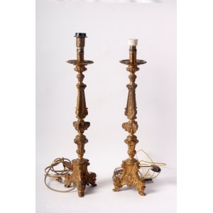 Lot of two electrified brass candlesticks first half of the 20th century 42 x 10 cm triangular in shape, Baroque style, raised parts with rocaille decoration State of preservation: very good, Lot of two electrified brass candlesticks first half of the 20t