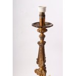 Lot of two electrified brass candlesticks first half of the 20th century 42 x 10 cm triangular in shape, Baroque style, raised parts with rocaille decoration State of preservation: very good, Lot of two electrified brass candlesticks first half of the 20t