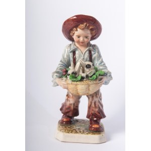 Boy with rabbits 1950s 26 x 11.5 x 10.5 cm full-round sculpture in polychrome ceramic with casting moulding. Signature engraved in the paste at the base. Condition: very good, small loss on the enamel of the little finger of the right hand., Boy with rabb