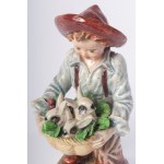 Boy with rabbits 1950s 26 x 11.5 x 10.5 cm full-round sculpture in polychrome ceramic with casting moulding. Signature engraved in the paste at the base. Condition: very good, small loss on the enamel of the little finger of the right hand., Boy with rabb