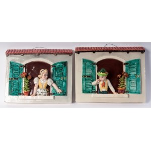 &quot;He and She&quot;, Pair of relief plaques, First half of the 20th century 24 x 29 x 9 cm polychrome ceramic mold forming. TREVIR manufacture of Vicenza, signature in black under enamel at the base. State of preservation: good, with her restoration pl
