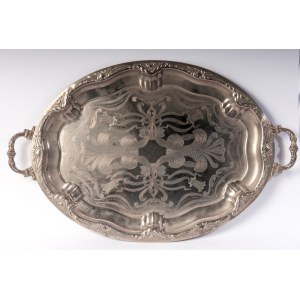Metal tray 20th century 65 x 41.5 x 2 cm oval in shape, with handle grips and floral decoration engraved on the bottom. State of preservation: good, with minimal oxidation on the surface., Metal tray 20th century 65 x 41.5 x 2 cm oval in shape, with handl