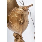 Triton supporting a boat, volume sculpture 78 x 50 x 20 cm on a quadrangular leaf-shaped base in gilded metal. Gift with signature and dedication 29 June 1901 Condition: good, minimal wear to the gilding as per use over time, Triton supporting a boat, vol