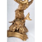 Triton supporting a boat, volume sculpture 78 x 50 x 20 cm on a quadrangular leaf-shaped base in gilded metal. Gift with signature and dedication 29 June 1901 Condition: good, minimal wear to the gilding as per use over time, Triton supporting a boat, vol