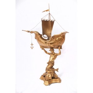 Triton supporting a boat, volume sculpture 78 x 50 x 20 cm on a quadrangular leaf-shaped base in gilded metal. Gift with signature and dedication 29 June 1901 Condition: good, minimal wear to the gilding as per use over time, Triton supporting a boat, vol