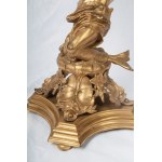 Triton supporting a boat, volume sculpture 78 x 50 x 20 cm on a quadrangular leaf-shaped base in gilded metal. Gift with signature and dedication 29 June 1901 Condition: good, minimal wear to the gilding as per use over time, Triton supporting a boat, vol