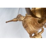 Triton supporting a boat, volume sculpture 78 x 50 x 20 cm on a quadrangular leaf-shaped base in gilded metal. Gift with signature and dedication 29 June 1901 Condition: good, minimal wear to the gilding as per use over time, Triton supporting a boat, vol