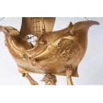 Triton supporting a boat, volume sculpture 78 x 50 x 20 cm on a quadrangular leaf-shaped base in gilded metal. Gift with signature and dedication 29 June 1901 Condition: good, minimal wear to the gilding as per use over time, Triton supporting a boat, vol