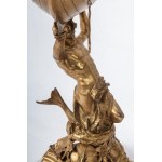 Triton supporting a boat, volume sculpture 78 x 50 x 20 cm on a quadrangular leaf-shaped base in gilded metal. Gift with signature and dedication 29 June 1901 Condition: good, minimal wear to the gilding as per use over time, Triton supporting a boat, vol