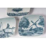 Lot of four bottoms 70s/80s 8 x 7.5 x 1 cm in polychrome porcelain, quadrangular with decoration of animals and landscapes in blue on a white background. Signature of the manufacturer in green under the glaze Condition: very good, one case back has a gap 