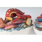 Pair of white earthenware vegetable dishes 34 x 24 x 16.5 cm with lid with embossed fish and shellfish. Probably Italian manufacture, first half of the 20th century State of preservation: good. minimal restorations to the lid., Pair of white earthenware v