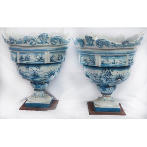 Pair of ceramic vases in a truncated conical shape mid 20th century 57 x 50 cm with slightly everted polylobed rim, body tapered towards the bottom resting on square bases. Decoration with views of cities, landscapes and allegorical figures in blue on a w