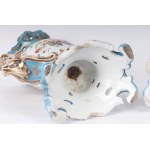 Pair of polychrome porcelain potiches France, second half of the 19th century 35 x 15 cm Baroque style with baluster body and flared shell-shaped foot and bud-shaped upper rim. Floral decoration within reserve on a white background with pure gold finishes