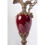Pair of bronze and ceramic pouring vases late 19th early 20th century 42 x 10 cm with a truncated conical body tapering towards the bottom in red ceramic, with a bronze foot and spout. State of preservation: good., Pair of bronze and ceramic pouring vases