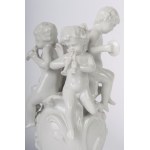 Set of white porcelain music-making angels composed of: 19 x 7.5 cm; 16 x 5 cm a centerpiece with four angels and four single angels all on a pedestal in the shape of a bud. Ginori manufacture. first half of the 20th century State of conservation: one ang
