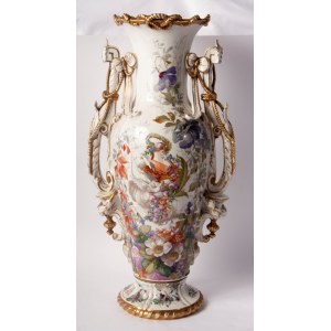 Porcelain vase first quarter of the 20th century 64 x 20 x 19 cm with a baluster tapered downwards with a disc-shaped support foot, rounded shoulder, long neck with a slightly everted rim. Handle grips. Floral decoration on a white background with musical
