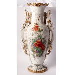 Porcelain vase first quarter of the 20th century 64 x 20 x 19 cm with a baluster tapered downwards with a disc-shaped support foot, rounded shoulder, long neck with a slightly everted rim. Handle grips. Floral decoration on a white background with musical