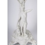 Pair of four-light candelabra 50 x 16 cm in Baroque style porcelain in white monochrome with base and rocailles accompanied by male and female characters with satyr and putto. Ginori manufacture, first half of the 20th century State of conservation: missi