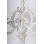 Pair of four-light candelabra 50 x 16 cm in Baroque style porcelain in white monochrome with base and rocailles accompanied by male and female characters with satyr and putto. Ginori manufacture, first half of the 20th century State of conservation: missi