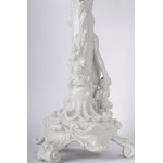 Pair of four-light candelabra 50 x 16 cm in Baroque style porcelain in white monochrome with base and rocailles accompanied by male and female characters with satyr and putto. Ginori manufacture, first half of the 20th century State of conservation: missi
