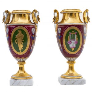 Pair of vases, France, mid-19th century 26 x 8 x 8 cm in polychrome porcelain, urn-shaped body ending with a round beaded foot on a square base. Funnel-shaped neck with a pair of swan-shaped handles. Reserve decorations on a red background with mule profi