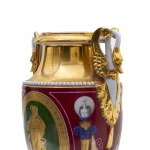 Pair of vases, France, mid-19th century 26 x 8 x 8 cm in polychrome porcelain, urn-shaped body ending with a round beaded foot on a square base. Funnel-shaped neck with a pair of swan-shaped handles. Reserve decorations on a red background with mule profi