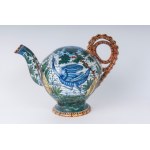 &quot;Drink if you can&quot; first quarter of the 20th century 22 x 29 x 11 cm in polychrome ceramic with peacock, leaf and shrub decoration. Globular shape tapered towards the bottom with disc foot, comma-shaped spout and spiral handle. Signed on the bas