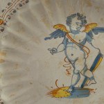 Crespina centerpiece, Deruta, first quarter of the 17th century 24.5 x 6 x 10 cm in compendiary ceramics. Mixtilinear edge with pods that start from the rim and reach the center of the plate. Central part raised from the ceramic body and ring-shaped suppo