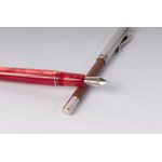 Lot of seven pens and two pencils: 6 ballpoint pens including a Parker, a Pelikan, a Dal Negro, a Faber Castell, a Bagutta and a Write Down desk pen in original boxes; a Delta fountain pen in original case with guarantee and two Faber Castell pencils Stat