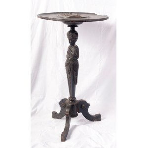 Gueridon 19th century 80 x 45 cm made of ebonized wood with a circular support surface with a female profile in relief in the centre, a caryatid stem and a three-legged support. State of conservation: missing and broken parts, Gueridon 19th century 80 x 4
