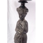 Gueridon 19th century 80 x 45 cm made of ebonized wood with a circular support surface with a female profile in relief in the centre, a caryatid stem and a three-legged support. State of conservation: missing and broken parts, Gueridon 19th century 80 x 4