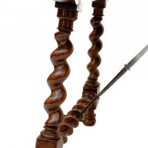 Goat-shaped table in walnut wood, 82 x 127 x 77 cm with four twisted legs, connected at the base by two wrought iron spears. Table with reassembled antique elements. Condition: good, wear and tear as per use over time., Goat-shaped table in walnut wood, 8