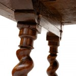 Goat-shaped table in walnut wood, 82 x 127 x 77 cm with four twisted legs, connected at the base by two wrought iron spears. Table with reassembled antique elements. Condition: good, wear and tear as per use over time., Goat-shaped table in walnut wood, 8