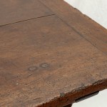 Goat-shaped table in walnut wood, 82 x 127 x 77 cm with four twisted legs, connected at the base by two wrought iron spears. Table with reassembled antique elements. Condition: good, wear and tear as per use over time., Goat-shaped table in walnut wood, 8