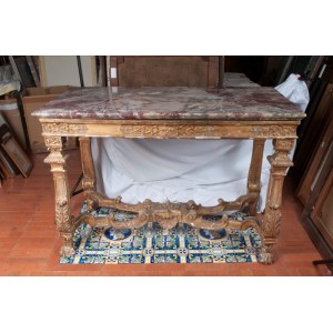 Carved and gilded wooden centre table 19th century 85 x 123 x 63 cm with plant motifs. Zoomorphic support foot connected to the base by a crossed motif. Breccia delle Alpi marble top. State of preservation: several points of the gilding have fallen off, C