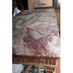 Carved and gilded wooden centre table 19th century 85 x 123 x 63 cm with plant motifs. Zoomorphic support foot connected to the base by a crossed motif. Breccia delle Alpi marble top. State of preservation: several points of the gilding have fallen off, C