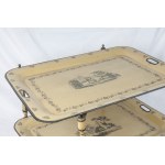 Folding table first quarter of the 20th century 57 x 82 x 82 cm in pistachio green lacquered metal with black finishes. It features two food trays per shelf decorated with floral motifs and a genre scene en suite with the table uprights. State of preserva