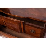 Two-drawer chest of drawers first half of the 20th century 80 x 84 x 42 cm rectangular in shape with a projecting front and four sabre legs. In mahogany veneered wood. Geometric fruitwood finishes and central medallion on the front with line inlaid measur