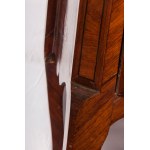 Two-drawer chest of drawers first half of the 20th century 80 x 84 x 42 cm rectangular in shape with a projecting front and four sabre legs. In mahogany veneered wood. Geometric fruitwood finishes and central medallion on the front with line inlaid measur